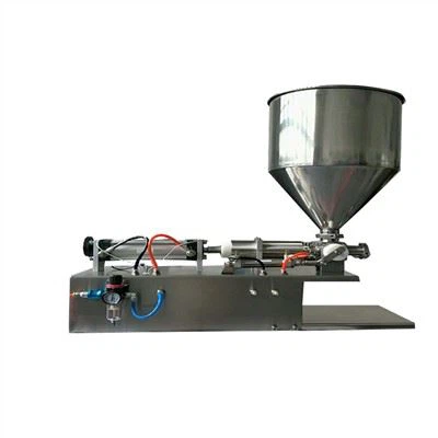 Màquina de farciment d'embotellament de mel